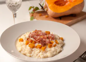 Risotto con speck y burrata