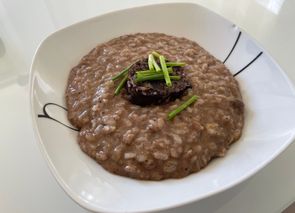 Risotto de morcilla, manzana y parmesano